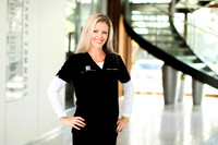 Crisp corporate headshot highlighting expert posing direction by Glenn Inskeep.